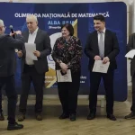 video inspectorul general cornel sandu aur pentru organizarea olimpiadei de matematica alba iulia orasul cu cel mai mare iq din tara timp de cateva zile